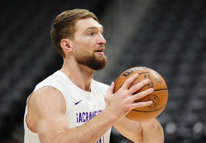 Feb 14, 2024; Denver, Colorado, USA; Sacramento Kings forward Domantas Sabonis (10) warms up before the game against the Denver Nuggets at Ball Arena. Mandatory Credit: Ron Chenoy-USA TODAY Sports  